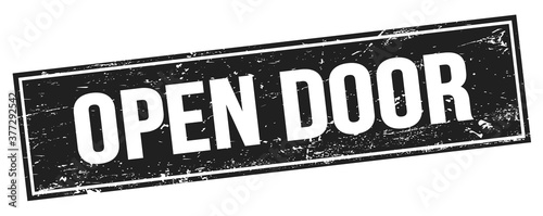 OPEN DOOR text on black grungy rectangle stamp.