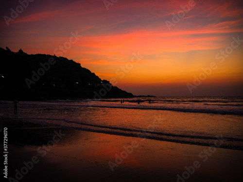 Mystic sunset on lonely beach in Gokarna, Karnataka, India.