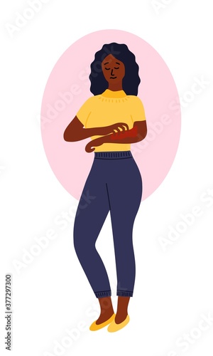 African, black woman combs one hand with the other. Sad and tired expression on his face. The girl suffers from itching and flaking of the skin. Atopic dermatitis, eczema, dry skin.