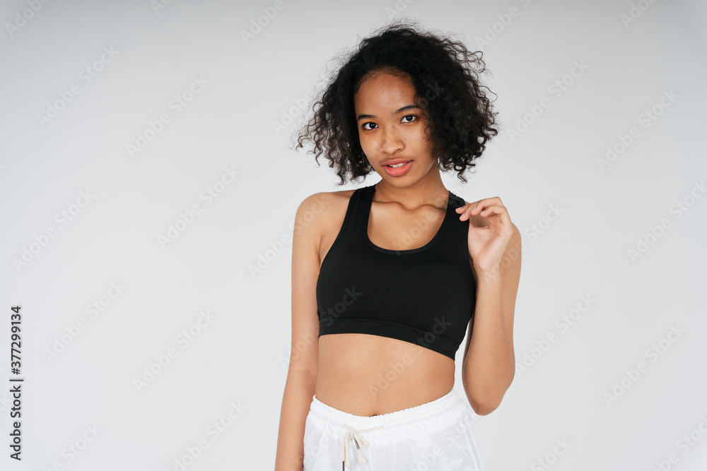 Portrai of mixed race african and thai woman in black sport bra. Portrai of mixed race african and thai woman in black sport bra.