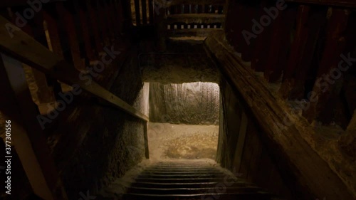 Slow motion shot of creepy basement stairs. Ghost story, horror, thriller setup