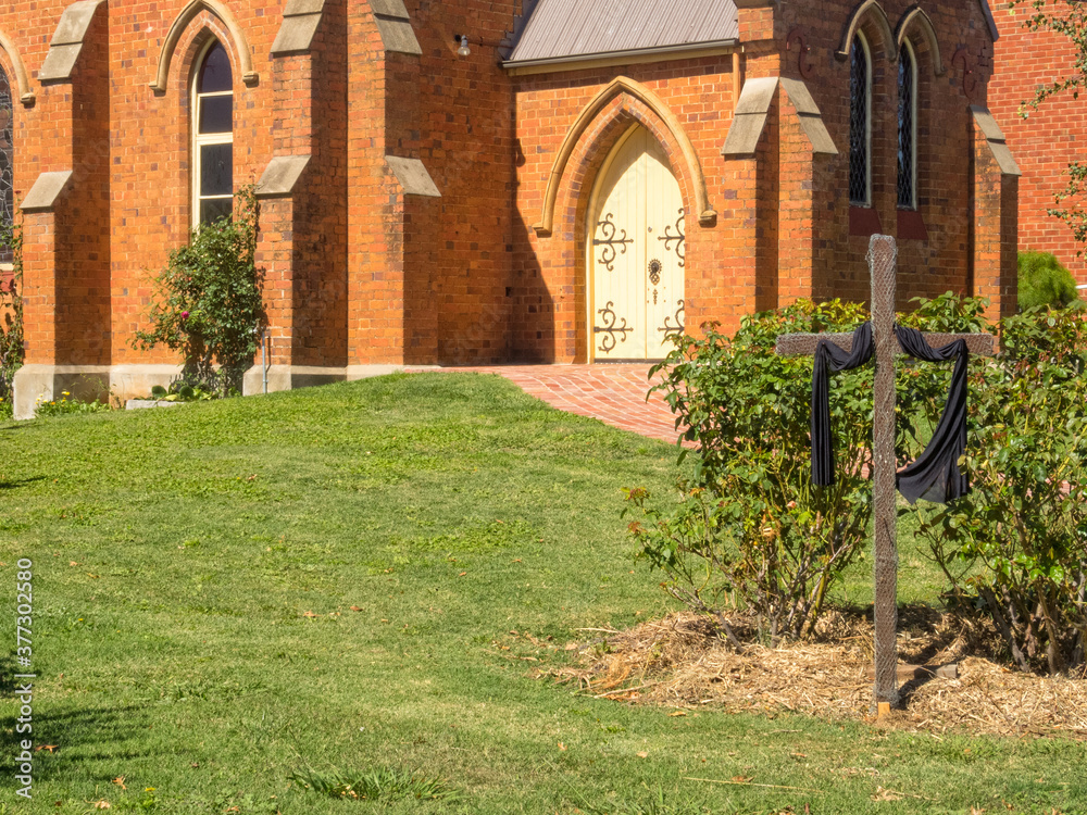Wooden cross in front of the St Andrew's Uniting Church - Mansfield, Victoria, Australia