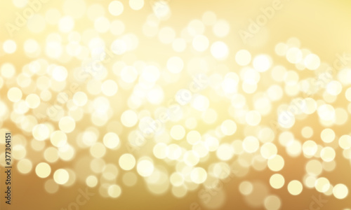 Gold glittering background with bokeh effect. Golden twinkled light backdrop for Wedding or Christmas decoration or xmas card website