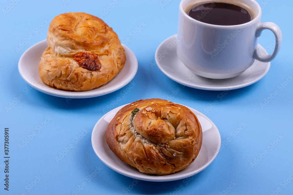 a cup of espresso and cinnamon roll a cup of espresso and cinnamon roll