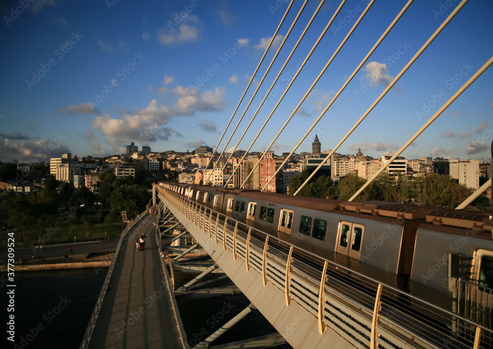 Golden Horn Metro Bridge in Istanbul City, Turkey. Galata Tower