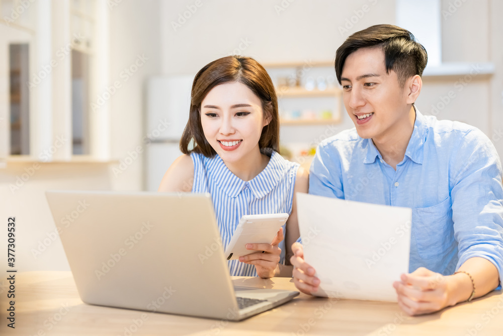 couple discuss finances at home couple discuss finances at home