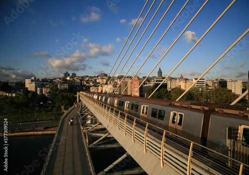 Golden Horn Metro Bridge in Istanbul City, Turkey. Galata Tower