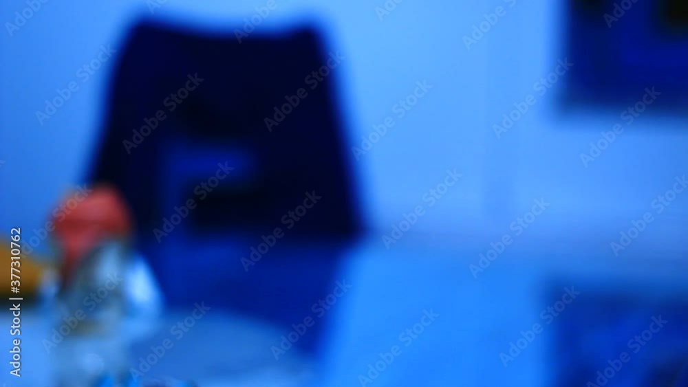 A chair near the table, out of focus room, home. Empty. Scary. A chair near the table, out of focus room, home. Empty. Scary.