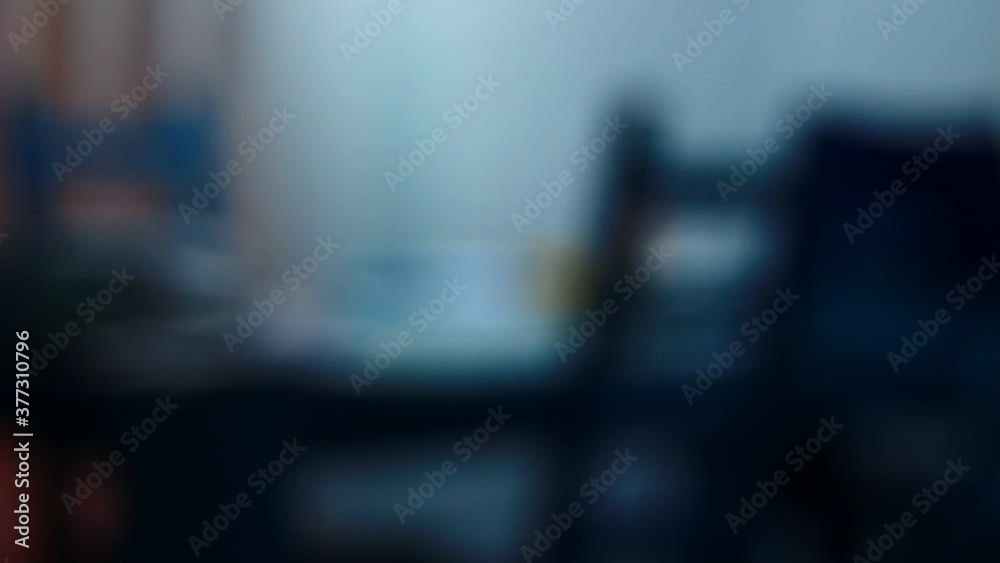 A chair near the table, out of focus room, home. Empty. Scary. A chair near the table, out of focus room, home. Empty. Scary.