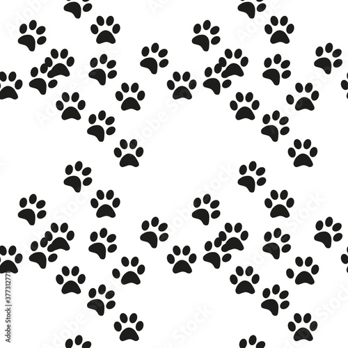 Black and white seamless pattern with paw prints. Abstract background, animal footprint, illustration.
