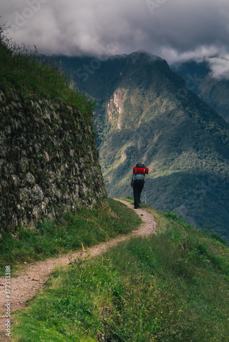 Back view of female traveller hiking on the Inca Trail, Peru