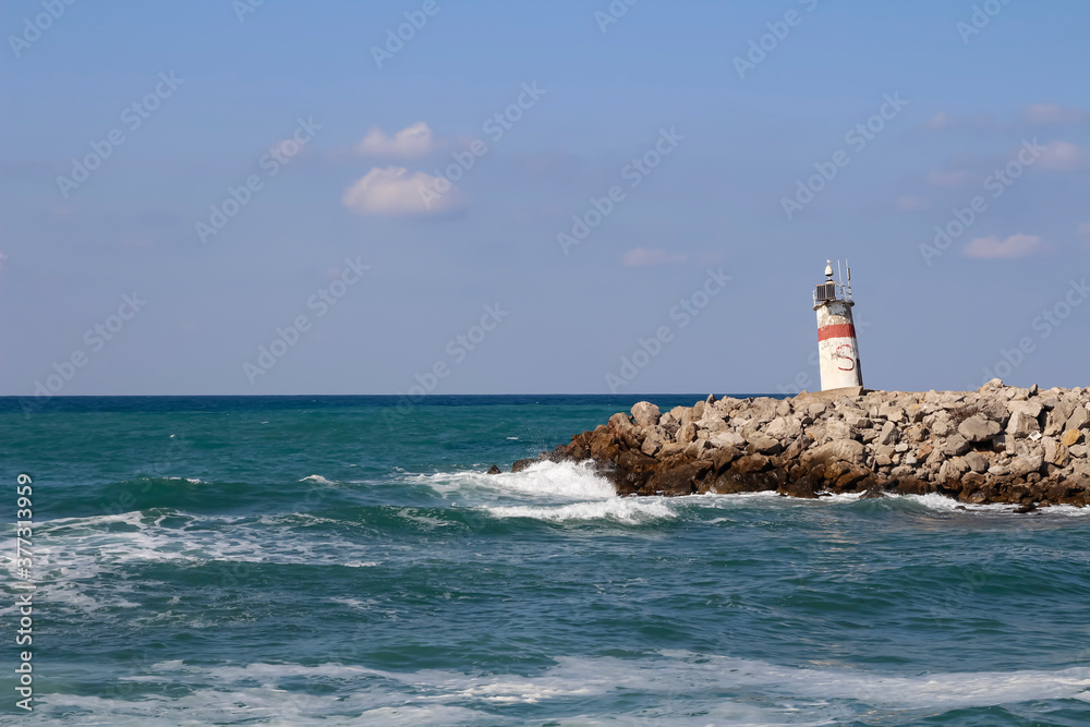 Agva lighthouse. Waves hitting the rocks