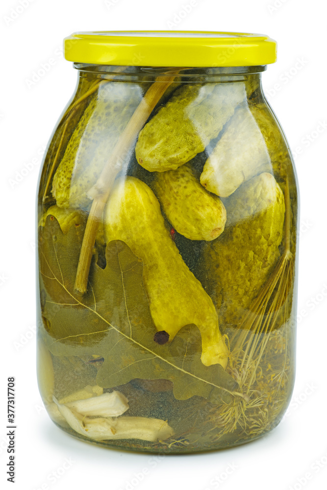 Glass jar with pickled cucumbers Glass jar with pickled cucumbers