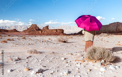 Walking among  geological formations of Jurassic period in Timna park, Middle...