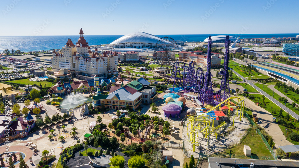 Sochi Park. Attractions. Landscape. infrastructure park. Russia. Amusement park and family holiday. alley of lights. Fountain. Roller coaster. Ferris wheel. hotel bogatyr