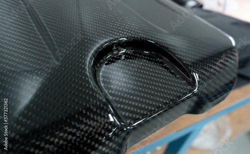 Beautiful carbon fiber product part by paint clear coat on top