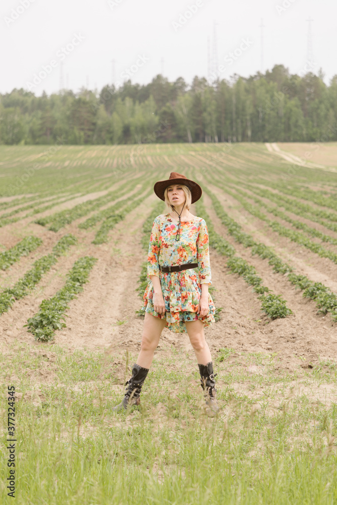 Cowboy girl in the field