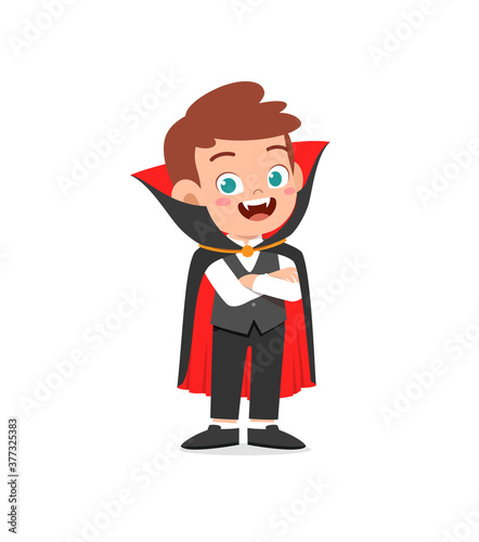 happy cute little kid boy and girl celebrate halloween wears dracula vampire costume with cape