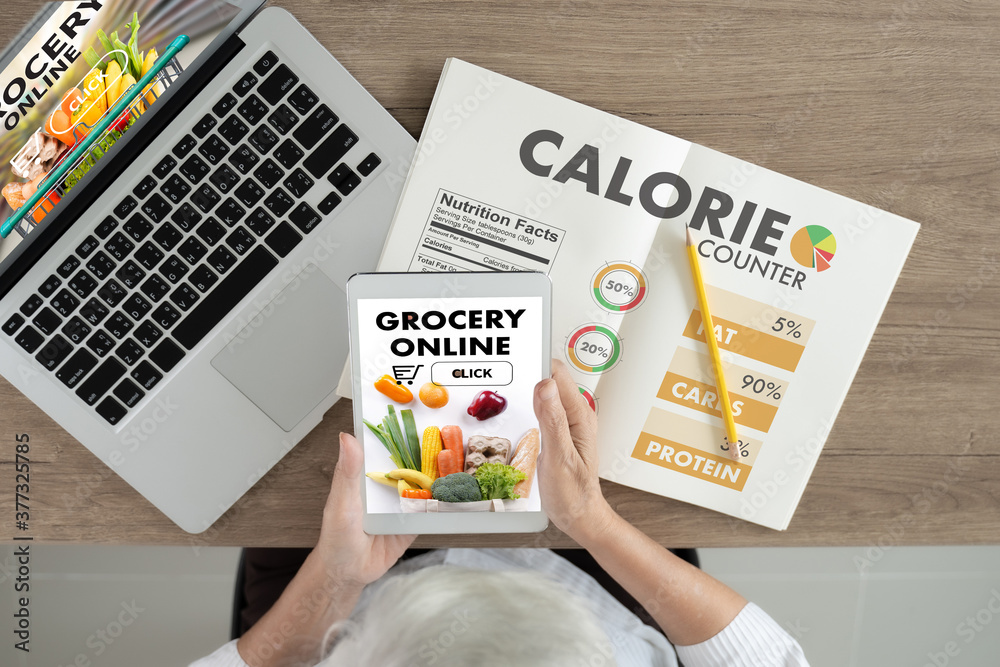 Obraz premium woman using mobile order delivery food to home older senior female shopping online, using apps