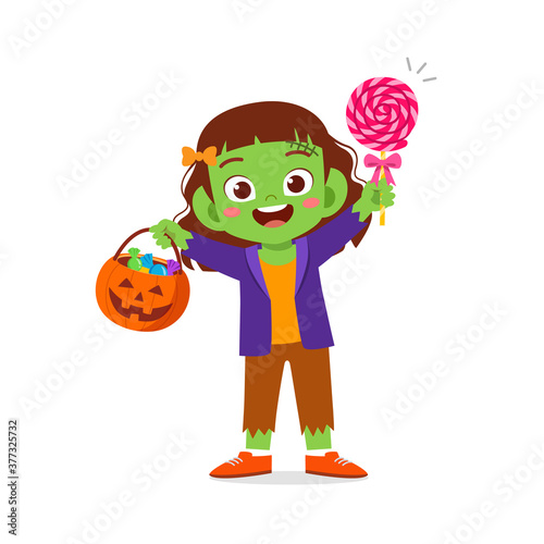 happy cute little kid boy and girl celebrate halloween wears frankenstein monster costume