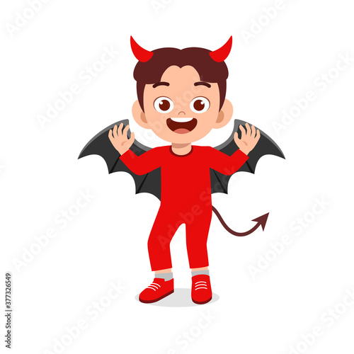 happy cute little kid boy and girl celebrate halloween wears red devil monster costume