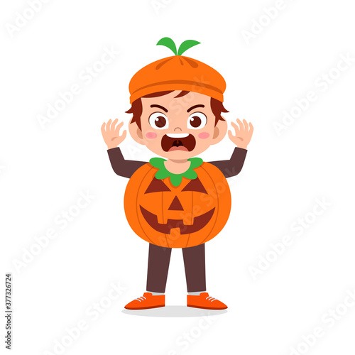 happy cute little kid boy and girl celebrate halloween wears pumpkin monster costume