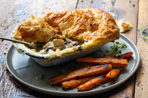 Chicken and mushroom pie with roast carrots