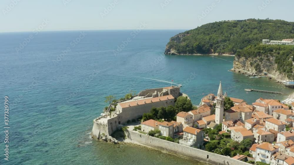 Aerial shot Budva Montenegro. Drone video of a city on the Adriatic coast surrounded by mountains with a beautiful landscape, with the old and the new city. Aerial shot Budva Montenegro. Drone video of a city on the Adriatic coast surrounded by mountains with a beautiful landscape, with the old and the new city.