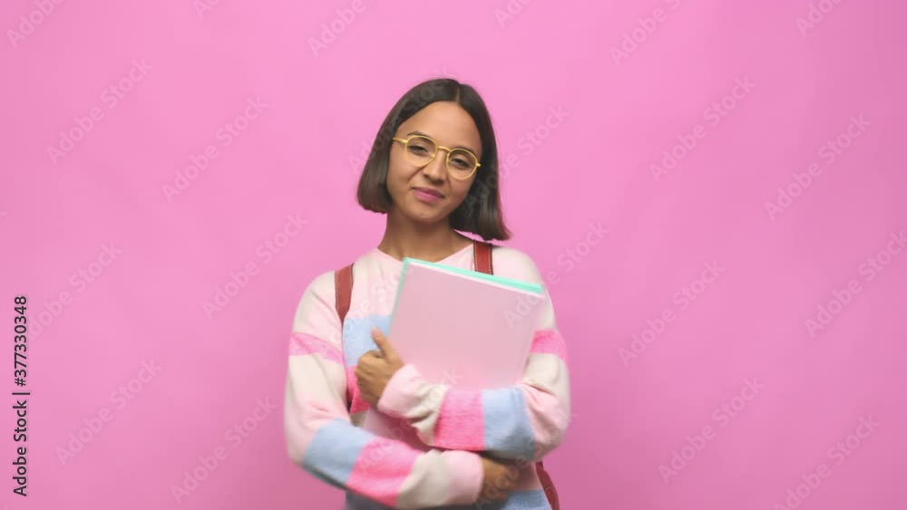 Young student indian woman happy, smiling and cheerful Young student indian woman happy, smiling and cheerful