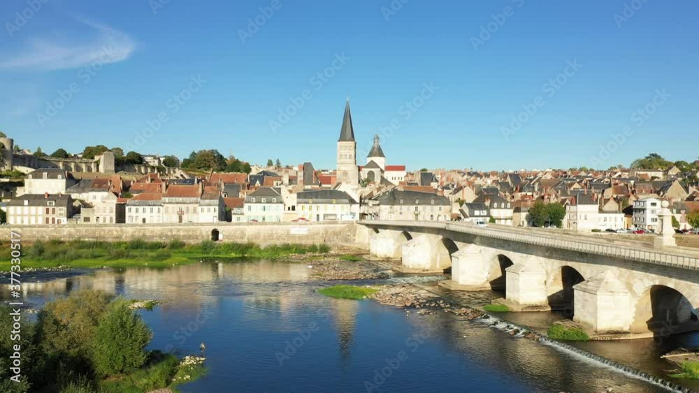 The Charite sur Loire bridge over the Loire in Europe, France, Burgundy, Nievre, in summer, on a sunny day. The Charite sur Loire bridge over the Loire in Europe, France, Burgundy, Nievre, in summer, on a sunny day.