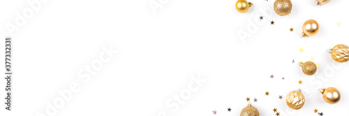 Festive white background with gold Christmas decorations. Flat lay, top view. Copy space for text.