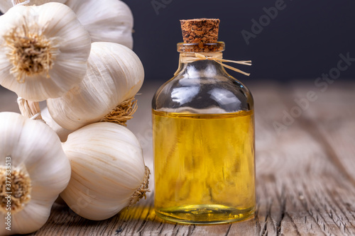 Glass bottle of garlic oil ...
