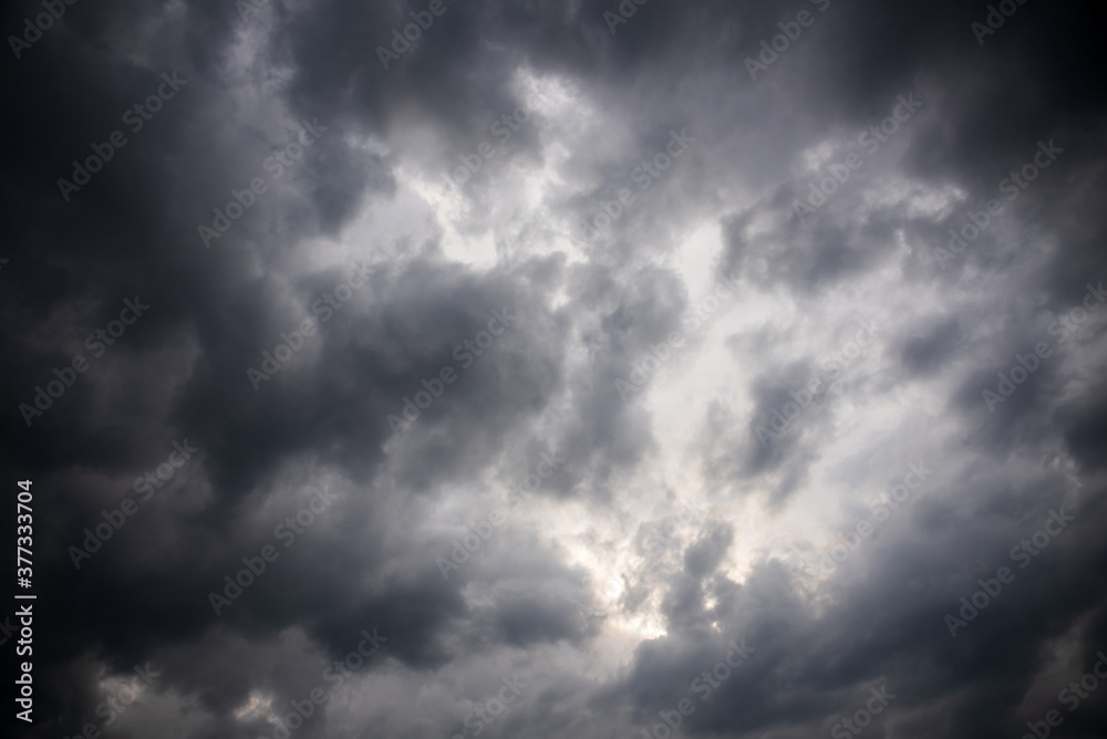 Stormy clouds on summer evening. Rainy sky before the storm. Stormy clouds on summer evening. Rainy sky before the storm.