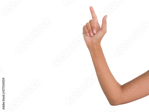 Hand finger pointing isolated on white background with slim hand skin tan woman.
