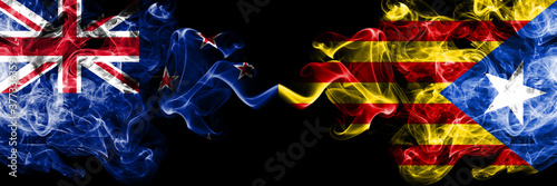 New Zealand vs Catalonia  Spain smoky mystic flags placed side by side. Thick colored silky abstract smoke flags