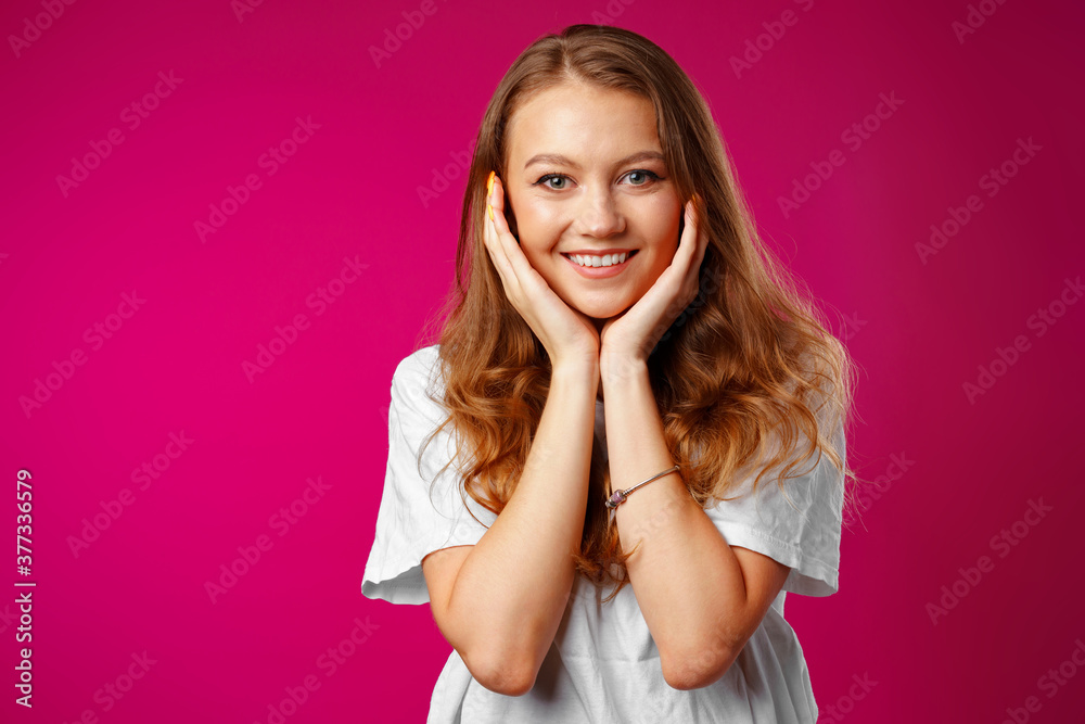 Portrait of a young beautiful happy woman smiling