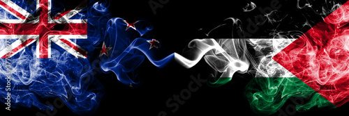 New Zealand vs Palestine, Palestinian smoky mystic flags placed side by side. Thick colored silky abstract smoke flags