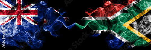 New Zealand vs South Africa, African smoky mystic flags placed side by side. Thick colored silky abstract smoke flags