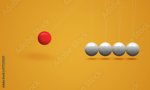 newton pendulum, newton's cradle. round red and white balls. Maths science concept  photo