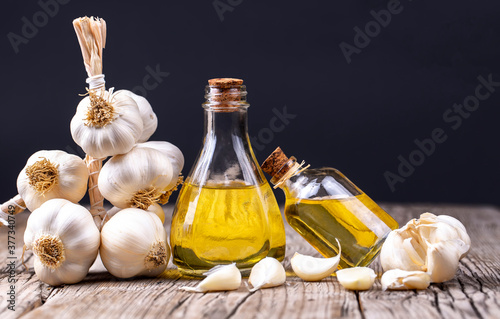 Glass bottle of garlic oil ...