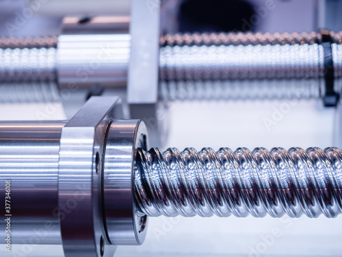 Quadro em tela Steel rod with a screw thread and a metal round detail, in industrial applications