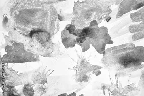 Background splash black on paper. Creative abstract art from ink and Alcohol ink colors. Marble texture. Oil painting on canvas. Hand oil painting. Color texture. Fragment of artwork. Spots of paint.
