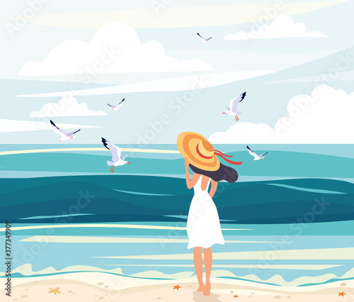 Woman in a straw sunhat at the seaside standing on the beach looking out over the ocean watching seagulls, colored vector illustration