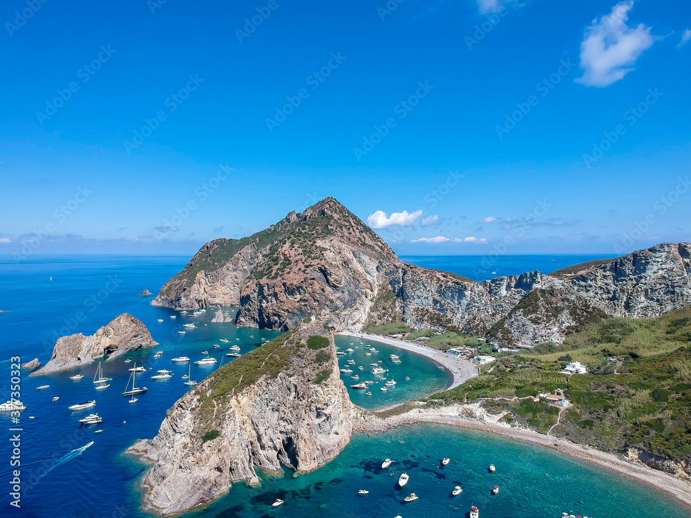 Ταπετσαρία Drone view of Palmarola island with chrystalline green water and boats (Ponza, Latina, Lazio, Italy)