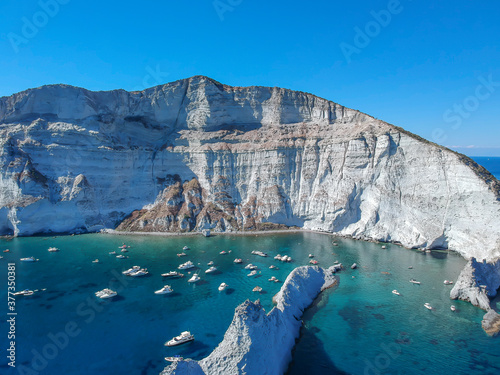 Drone view of  the bay of the seagull's nest along the rocky coast of Palmarola island (Ponza, Latina, Lazio, Italy).