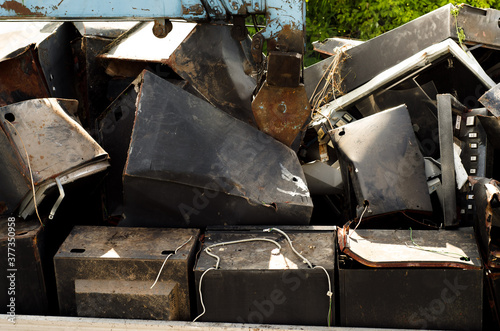 A pile of old scrap metal. Collection and recycling of recyclable materials. Rusty iron.