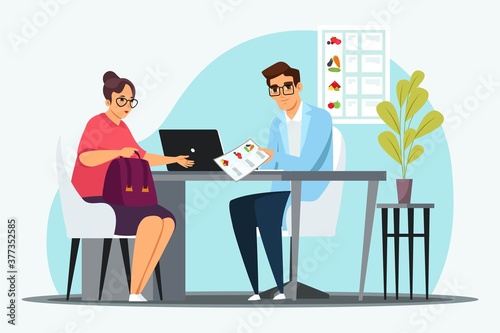 Nutritionist makes diet plan for woman patient in office