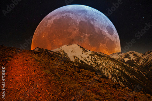 Fotografia, Obraz Huge moon guiding the way on midnight hike