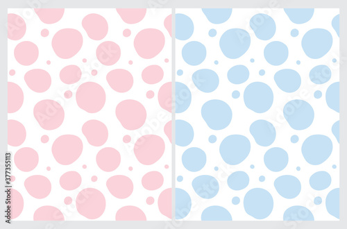 Simple Hand Drawn Irregular Dots Vector Patterns. Blue and Pink Dots on a White Background. Geometric Backdrop. Infantile Style Abstract Dotted Print.