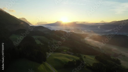 Drone flight over Tyrol landscape, at sunrise in Austria photo